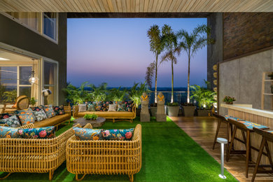 Design ideas for a contemporary balcony in Ahmedabad.