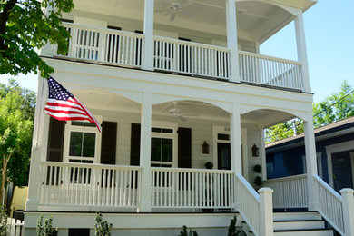 Mid-sized transitional gray two-story wood exterior home photo in Wilmington