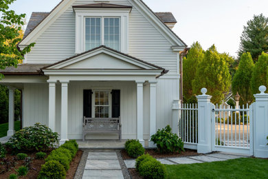 Inspiration for a mid-sized coastal home design remodel in New York