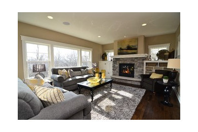 Inspiration for a contemporary living room in Chicago with a standard fireplace and a stone fireplace surround.