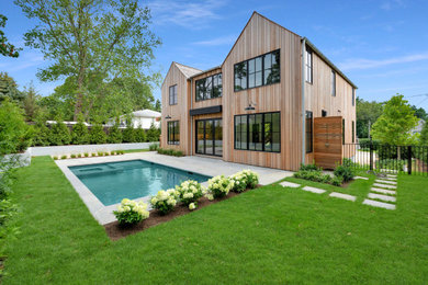 Inspiration for a transitional pool remodel in New York