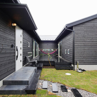 横浜のアジアンスタイルのおしゃれな中庭のテラス (日よけなし) の写真