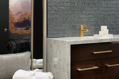 Design ideas for a large transitional 3/4 bathroom in Toronto with flat-panel cabinets, medium wood cabinets, black walls, an undermount sink, marble benchtops, white benchtops, a double vanity, a built-in vanity, black tile and subway tile.