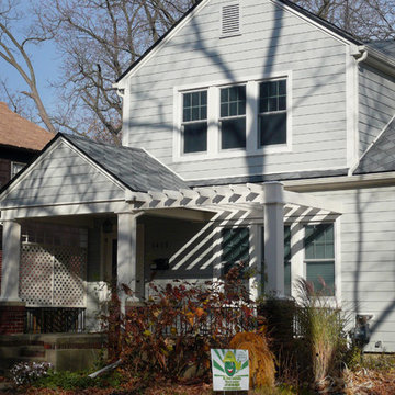 26 New Composite Widows, Green Composite Siding and New Gutters Too!