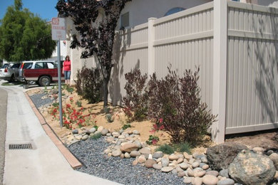 Example of a beach style home design design in San Luis Obispo
