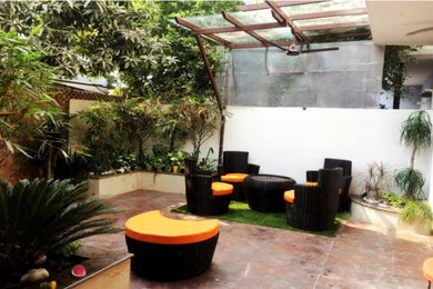 Example of an asian patio design in Delhi
