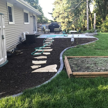 Anamosa Flagstone with Raised Vegitable Garden and Bullet Edging