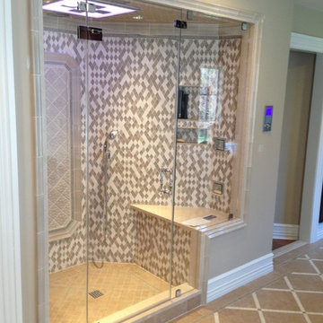 Frameless steam showers