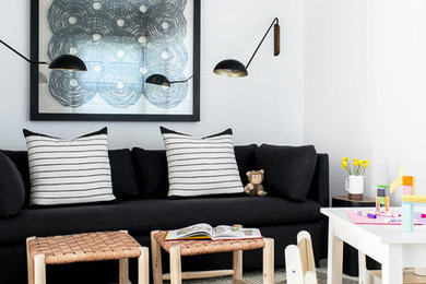 Example of a beach style family room design in New York