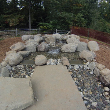 Natural Stone Waterfall into Pool