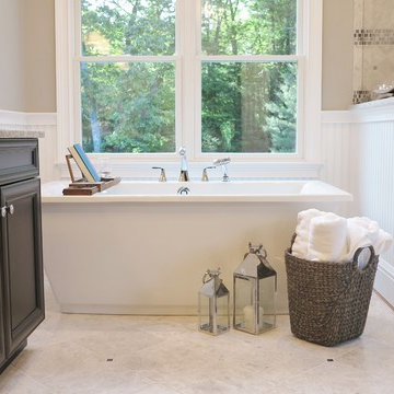 Transitional Striking Marble Master Bathroom in Avon