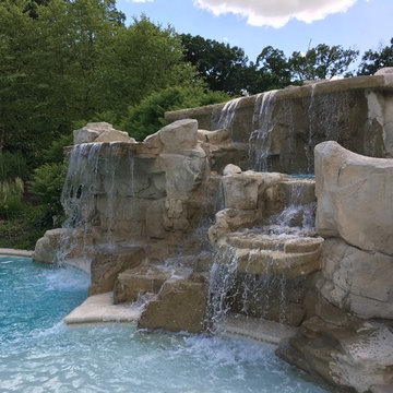 Cedar Rapids, Iowa - Custom Concrete Swimming Pool with Rock Waterfall Feature