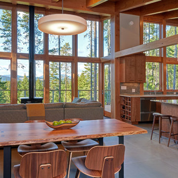 Interior view of the living, dining, and kitchen spaces.