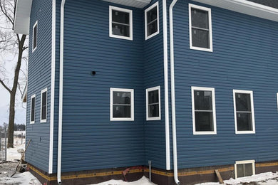 Kaycan Cabot blue country vinyl siding project in Caledon