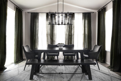 Example of a large minimalist light wood floor and gray floor kitchen/dining room combo design in Denver with white walls