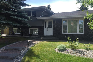 Inspiration for a mid-sized contemporary home design remodel in Calgary