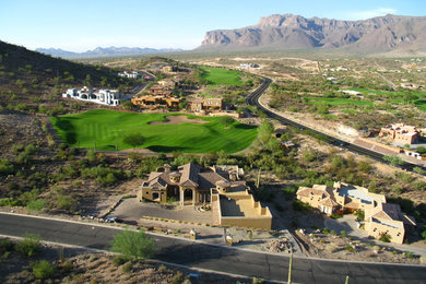 Example of a tuscan exterior home design in Phoenix