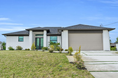 Example of a beach style exterior home design in Miami