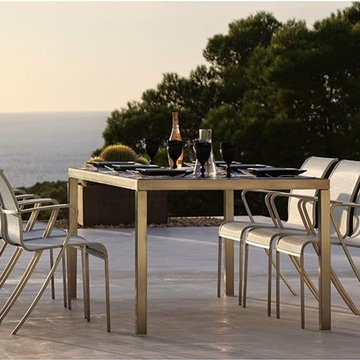 Taboela Glass Top Table and QT Chairs