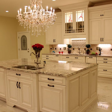 Luxurious Kitchen w/Antique White Cabinetry & Sienna Bordeaux Granite Countertop