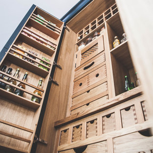 Mid-sized traditional kitchen pantry photos - Inspiration for a mid-sized timeless kitchen pantry remodel in Devon with shaker cabinets, blue cabinets and gray countertops