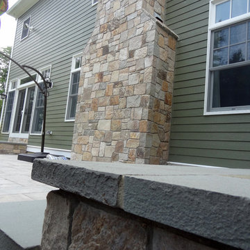 Combining Colonial Tan Natural Stone with Olive Green Siding