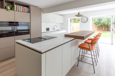 Design ideas for a contemporary kitchen in Sussex.