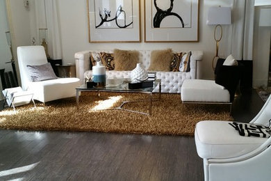 Example of a large trendy formal and open concept dark wood floor living room design in Atlanta with white walls