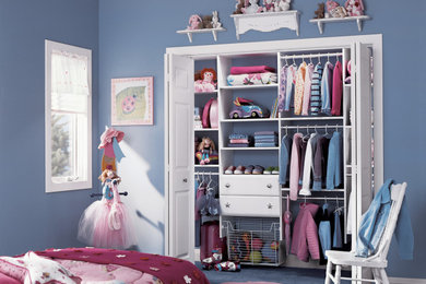Small elegant carpeted and blue floor reach-in closet photo in Other with flat-panel cabinets and white cabinets