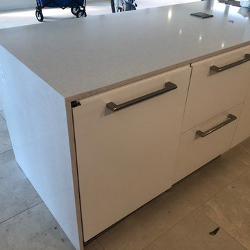 White Quartz Kitchen Countertop with Waterfall Leg