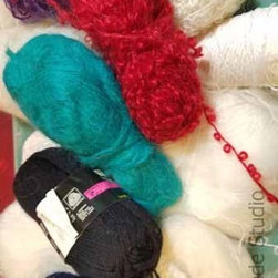 Planned yarn for shawl.  Will dye white when I get to those rings. - Products