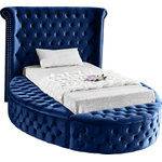 Meridian Furniture - Luxus Button Tufted Velvet Round Bed, Navy, Twin - Marvel at the remarkable beauty and graceful lines of this round Luxus navy velvet twin size bed. The headboard, footboard and side rails are all adorned with deep button tufting, and there is nailhead trim on both sides of the tall headboard. The footboard and side rails all contain ample storage and seating, making it easy to sit down in comfort so you can put on your pants or shoes.