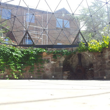 Geodesic dome skylight over sunken garden