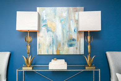 Example of a dining room design in Charleston with blue walls