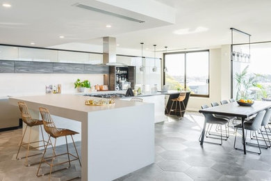Inspiration for a kitchen in Perth with quartz benchtops, white splashback and stone slab splashback.