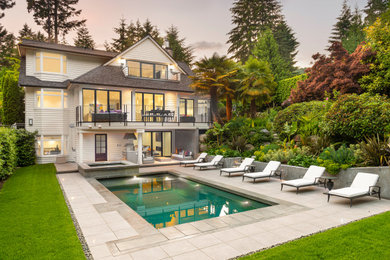 Example of a transitional exterior home design in Vancouver