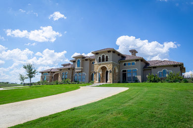 Tuscan exterior home photo in Dallas