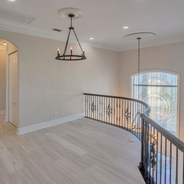 Loft Landing with Stained‑Glass Window