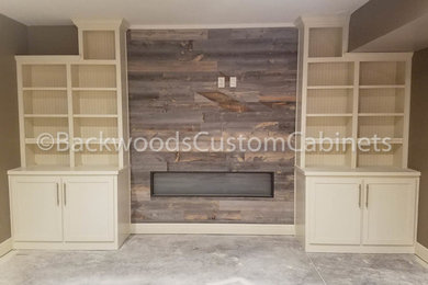 Example of a mid-sized trendy open concept game room design in Kansas City with a wall-mounted tv
