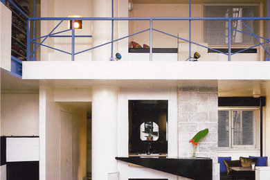 Living room - industrial living room idea in New York