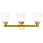 Livex Lighting - Catania 3-Light Polished Brass Vanity Sconce - The clean and simple Catania vanity sconce features a polished brass finish with hand blown clear glass. This sleek design will brighten up any bathroom.