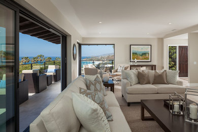 Mid-sized trendy formal and open concept light wood floor living room photo in Orange County with beige walls and no tv