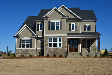 Rustic exterior home idea in Raleigh