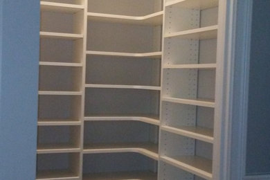 This is an example of an arts and crafts storage and wardrobe in Cincinnati.