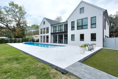 Transitional white two-story house exterior idea in Tampa