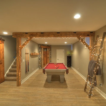 Contemporary-Rustic finished basement with reclaimed barn beams & wine room