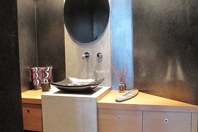 Inspiration for a mid-sized contemporary guest gray floor bedroom remodel in Omaha with black walls