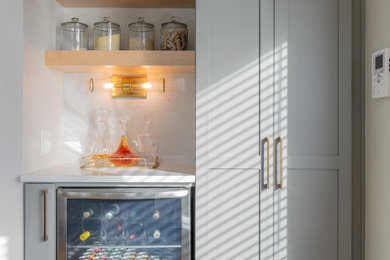 Inspiration for a mid-sized modern home bar remodel in Seattle