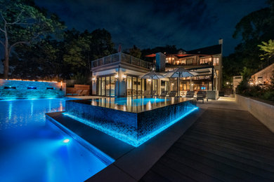 This is an example of a mid-sized modern home design in New York.