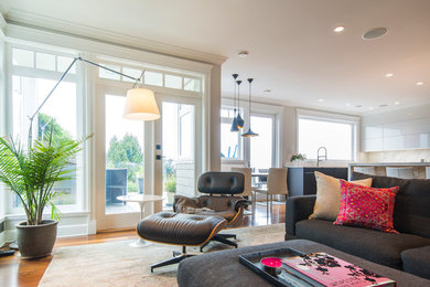 Example of a minimalist family room design in Vancouver